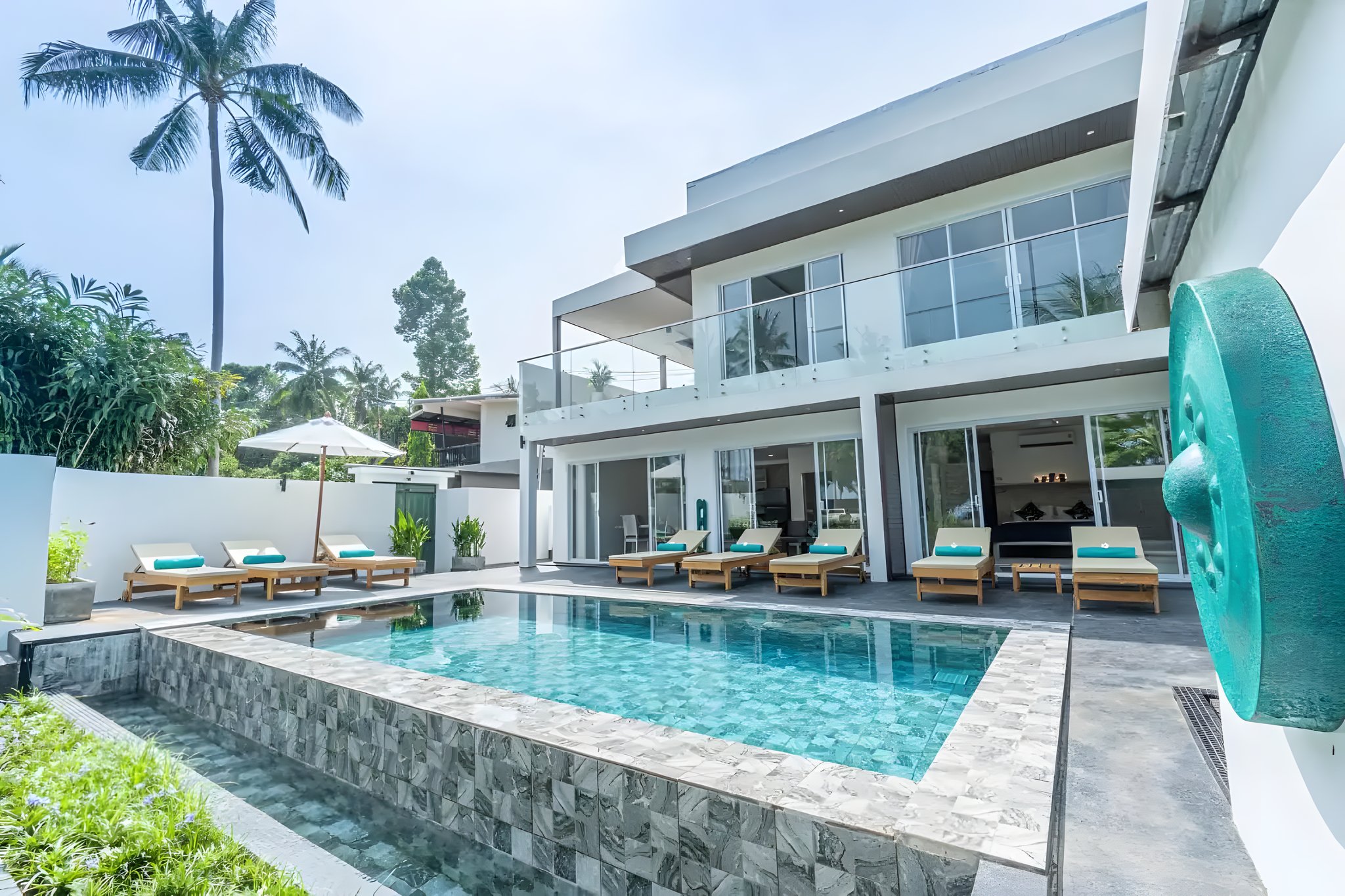 Loungers by the water