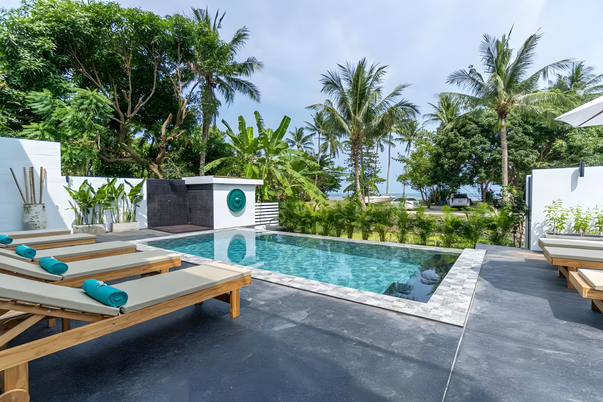 The pool in the palms at Balance Beach Villa