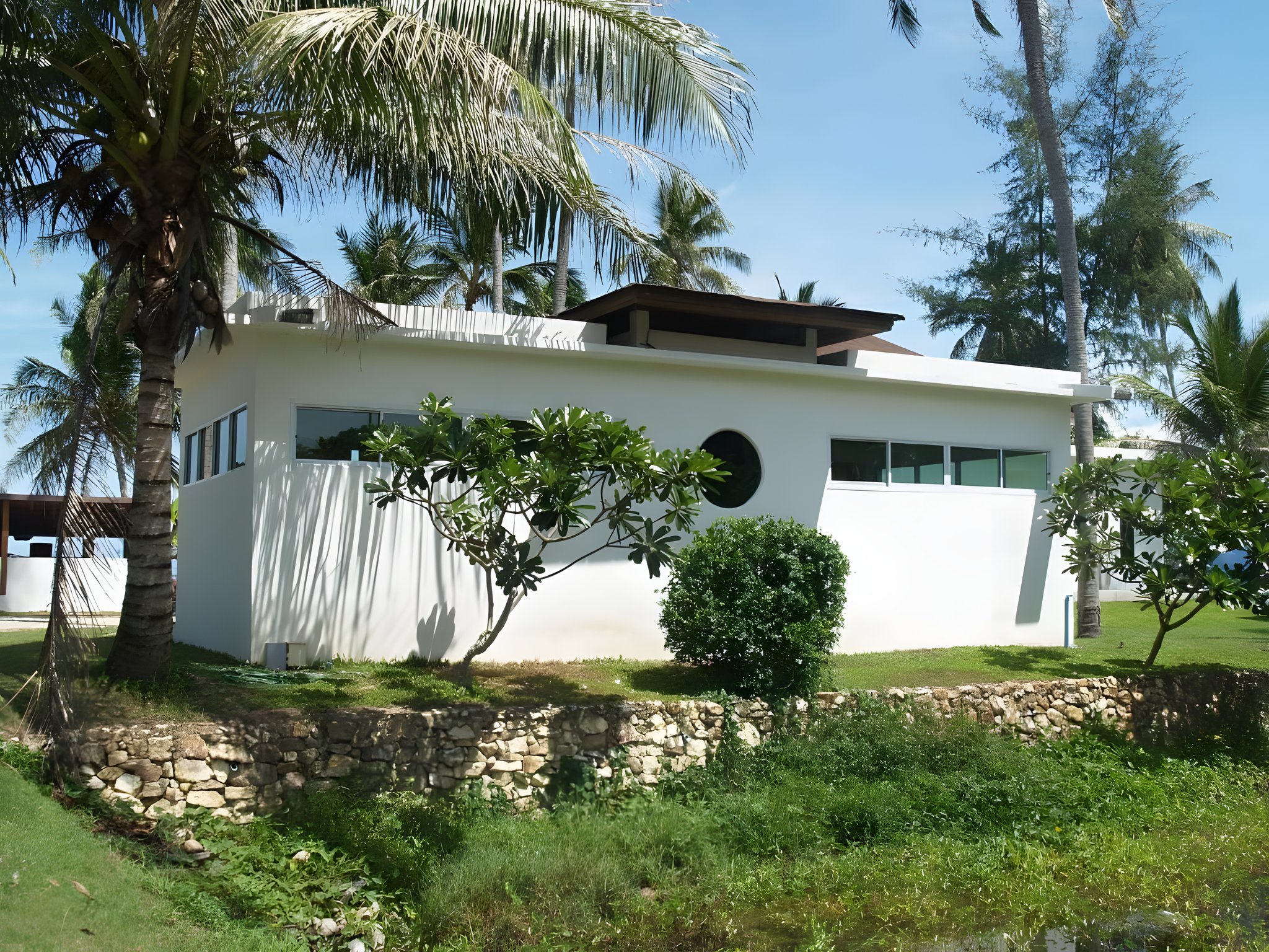 The white washed beachfront residence